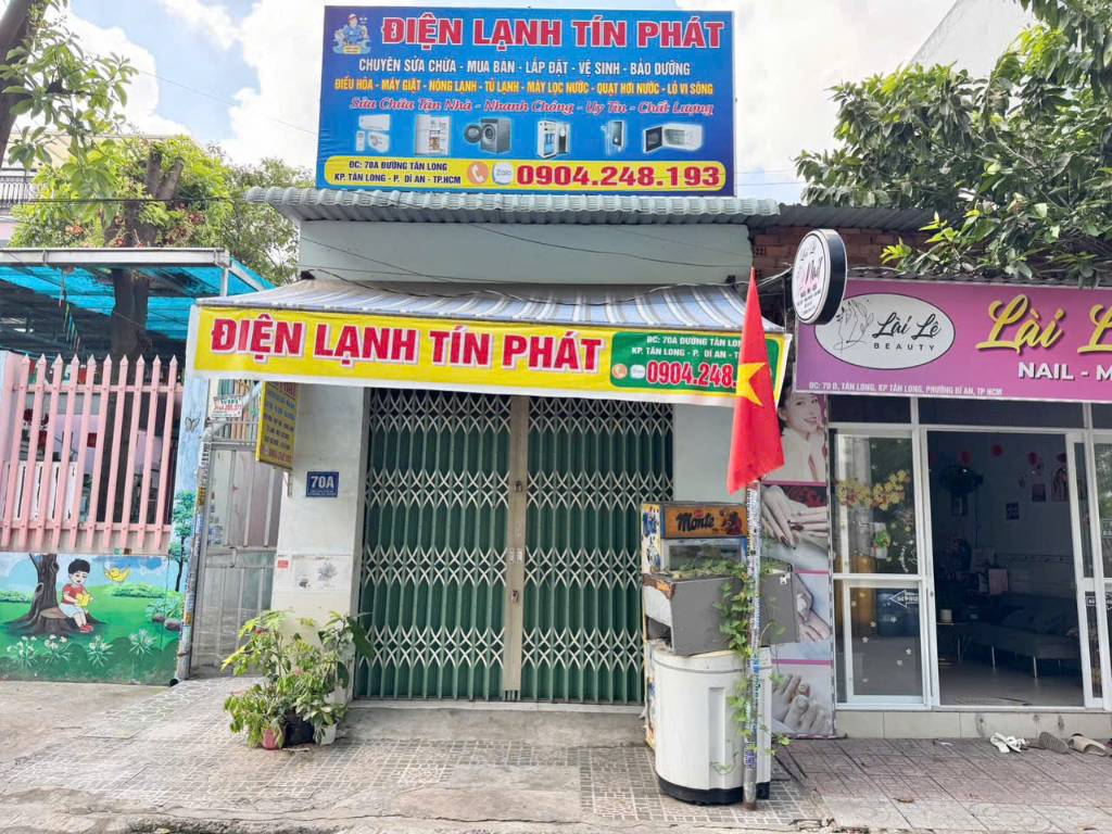 BÁN NHÀ MẶT TIỀN TÂN LONG, THÀNH PHỐ DĨ AN, SẴN 7 PHÒNG TRỌ DÒNG TIỀN GẦN 20TR/THÁNG