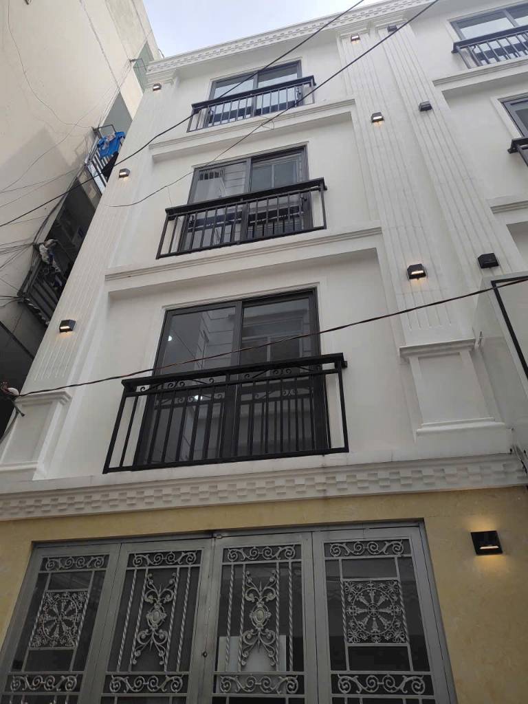 Nhà hẻm xe hơi 4 lầu - 90m2 - 10 phòng cho thuê thu nhập hơn 600 triệu năm