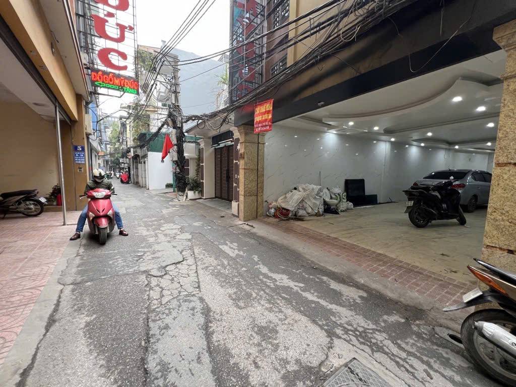 Bán tòa nhà văn phòng Trung Liệt, Đống Đa, 118m2, 6 tầng, gara oto, thang máy sịn, kinh doanh siêu dòng tiền