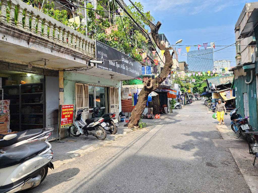 Bán Căn Hộ Tập Thể Tầng 1 Quỳnh Mai – Hai Bà Trưng – 85m² – 2 Mặt Ngõ – Ô Tô Đỗ Cửa – Kinh Doanh Tốt – Sổ Đỏ Chính Chủ