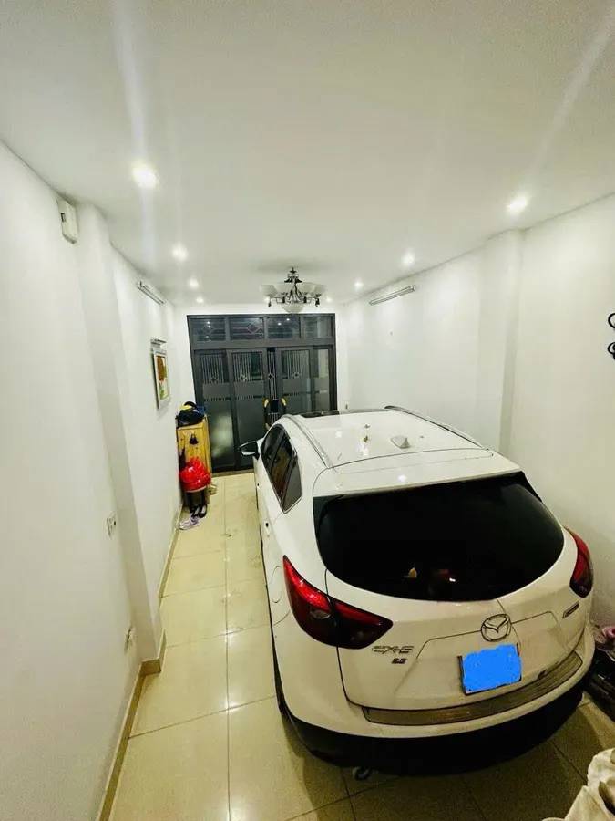 Bán nhà Đê La Thành, 54m2x5 tầng, gara ô tô tránh, giá tiềm năng
