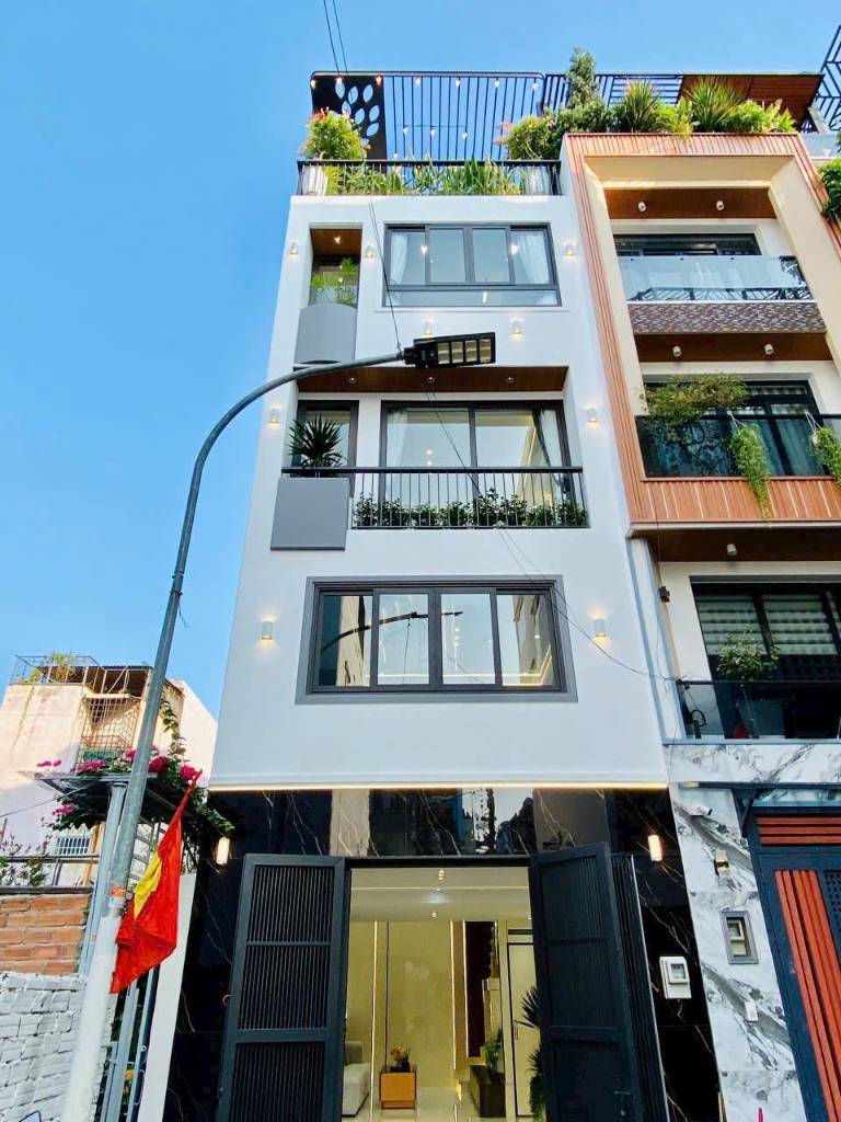 Nhà 1 trệt 3 lầu, mặt tiền chợ Hồ Văn Long, gần UBND Tân Tạo, Bình Tân, sổ riêng, DT 4x20m