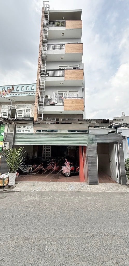 Bán nhà Phan Huy Ích, Gò Vấp, dt 150m2, đường 6m, thông tứ tung, dòng tiền 19 phòng 1 tỷ/ năm