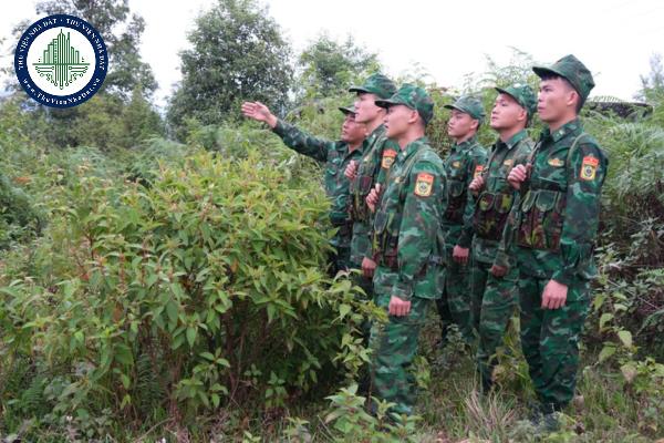 Nhiệm vụ, quyền hạn của UBND quận, huyện trong lĩnh vực quốc phòng được quy định như thế nào?