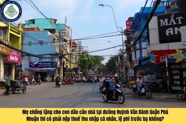 Mẹ chồng tặng cho con dâu căn nhà tại đường Huỳnh Văn Bánh Quận Phú Nhuận thì có phải nộp thuế thu nhập cá nhân, lệ phí trước bạ không?