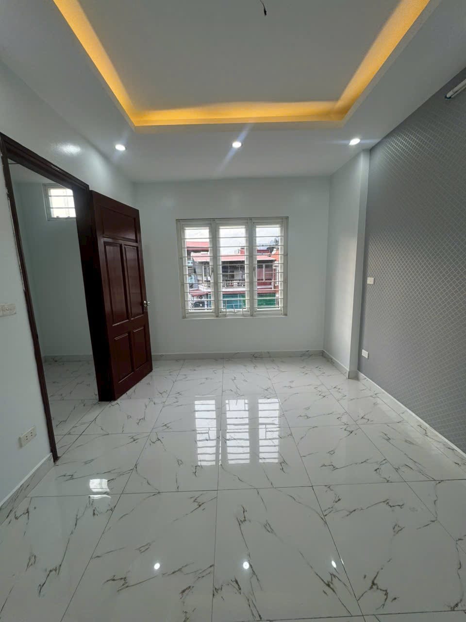 Nhà ngay trường Nguyễn An Ninh Trung Mỹ Tây DT 6x18,7 trệt 1 lầu sân thượng HXH 8m thông giá 8.79ty