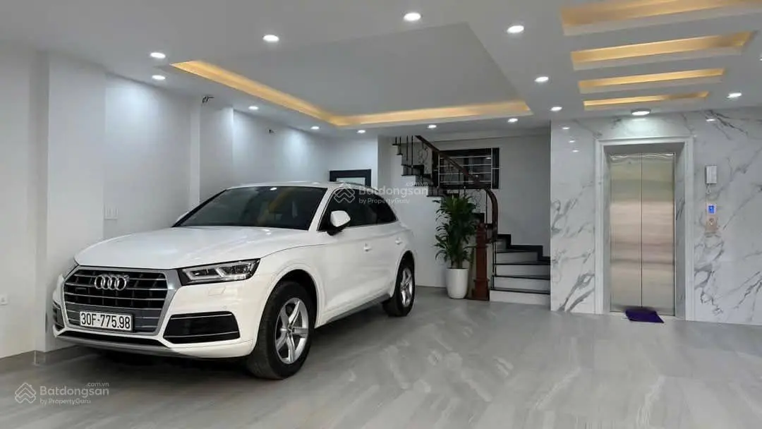 Bán nhà riêng 100m2 x 7 tầng thang máy đường Chùa Láng Đống Đa giá 33 tỷ