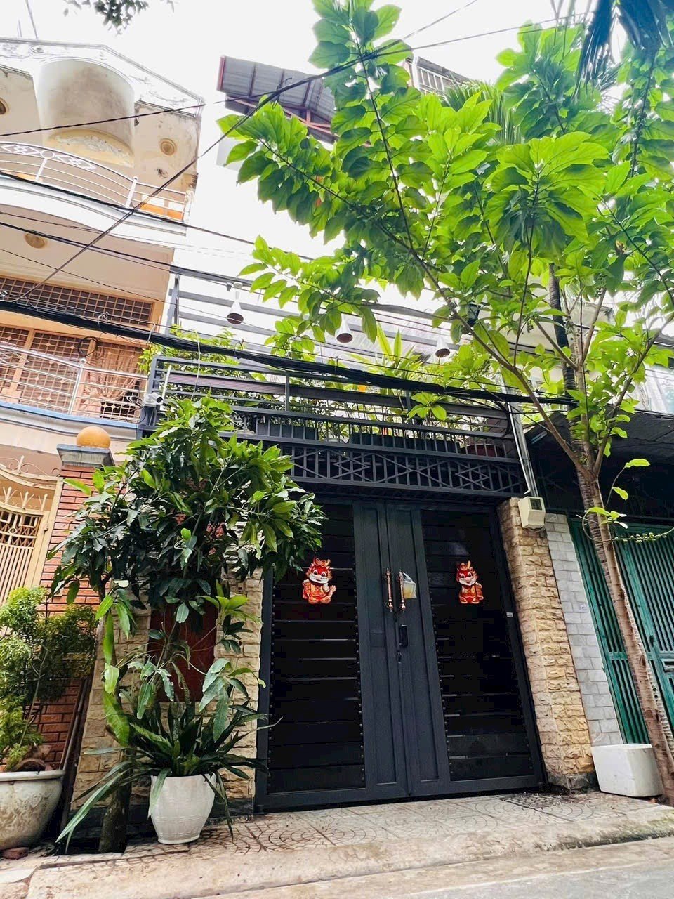 Bán nhà Bùi Đình Túy, oto ngủ trong nhà, 4 tầng có tầng hầm, 7 PN,  giá 11.7 tỷ