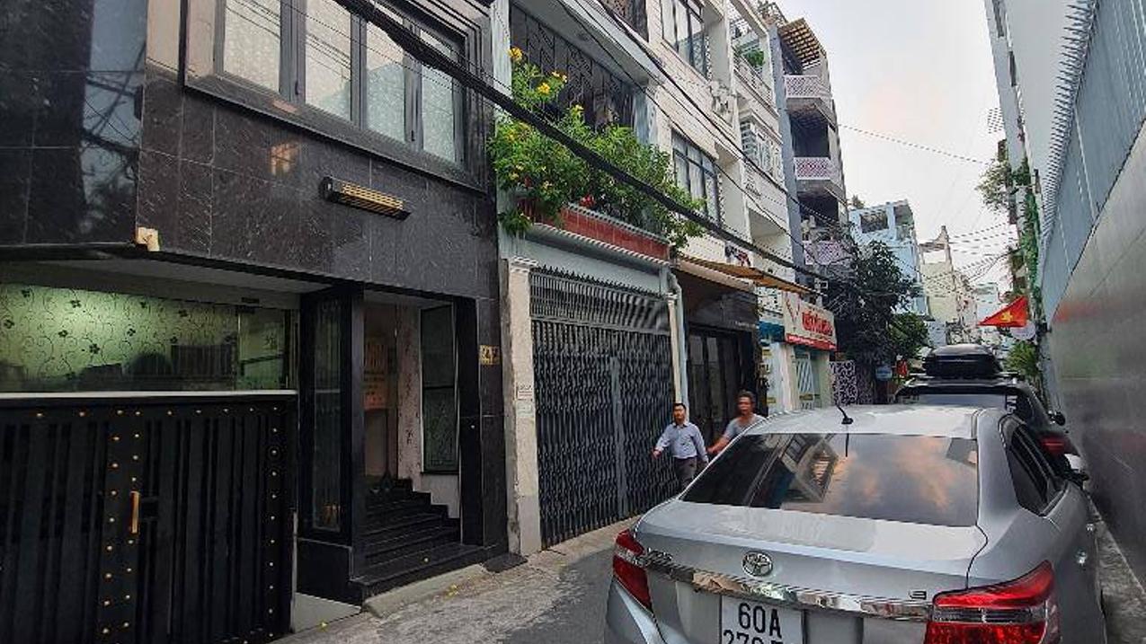 Bán tòa nhà khách sạn Nguyễn Thị Thập, Quận 7, 6 tầng, 16 phòng ngủ, giá 14 tỷ